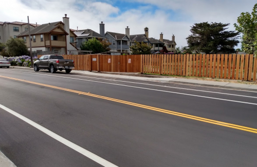 Road with double yellow lines and white striping